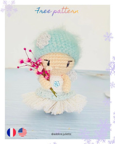 Free Crochet Pattern: Winter Fairy Amigurumi Doll with Blue Hat and Flower Bouquet