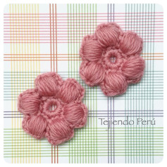 Puff stitch flower crochet pattern diagram with symbols and instructions